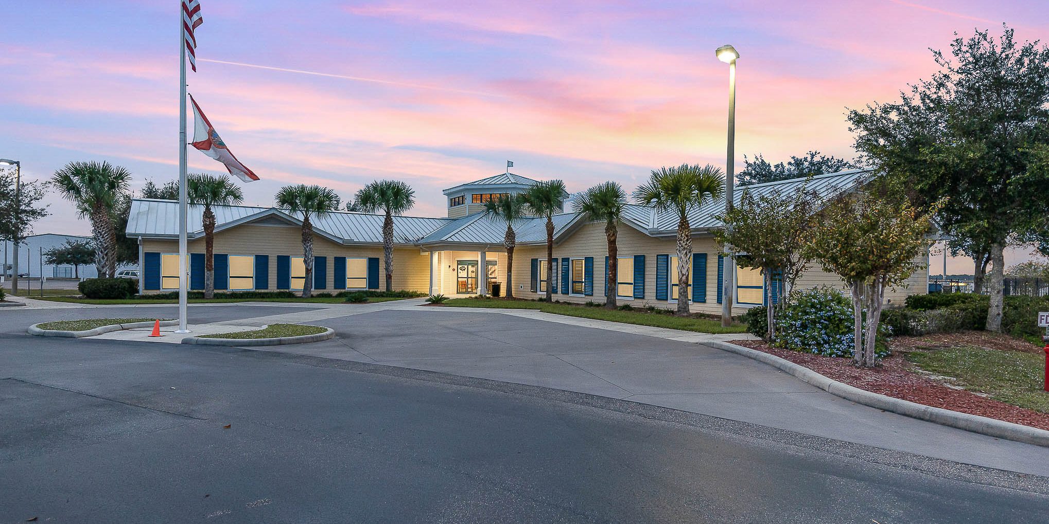 Space Coast airport exterior at sunset